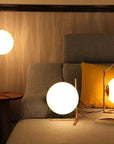 Lampe de chevet design bras dorés & boule de verre - Lampe Chevet Design
